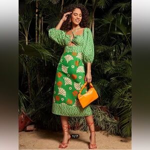 Green Patterned Dress with Orange Accents